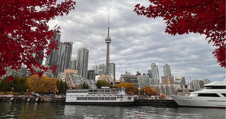 Toronto in autumn with fall foliage across the city